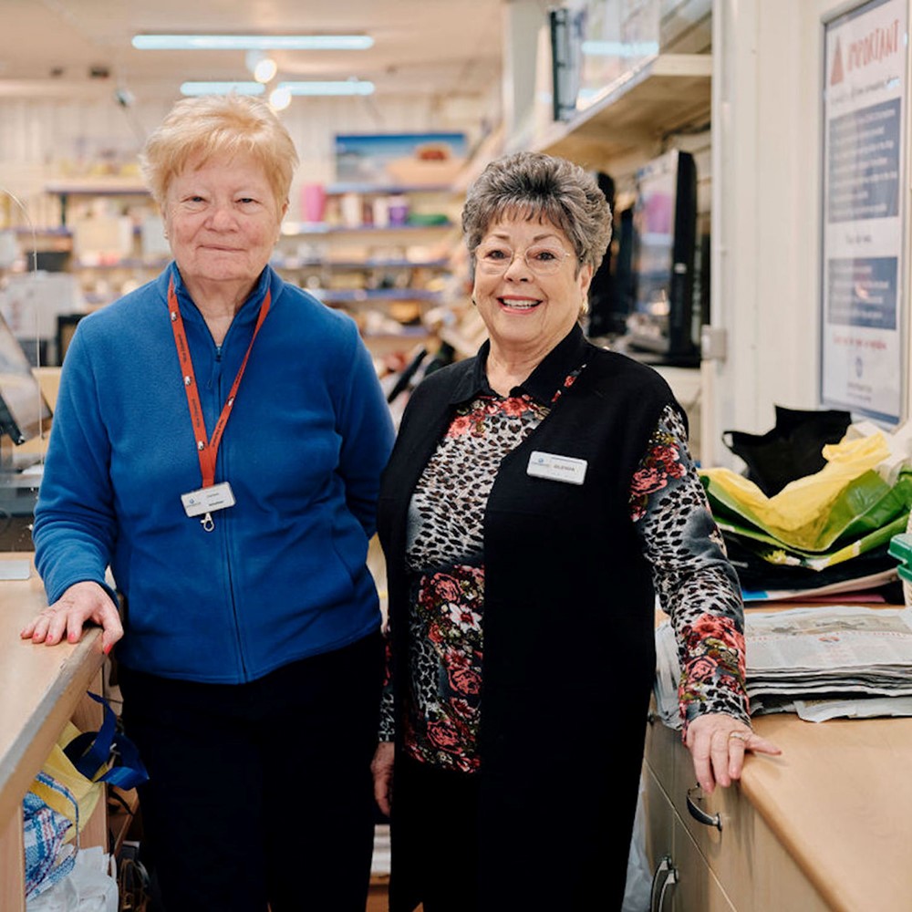 image of two hospice volunteers in fundiaising store