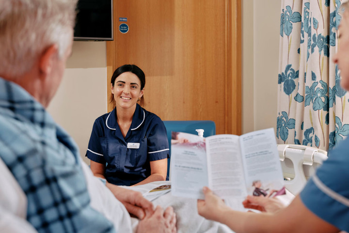 Nurse and patient with leaflet