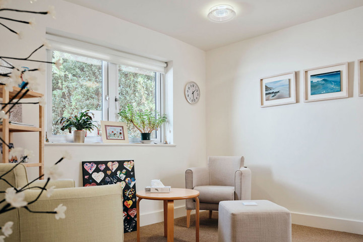Image of bereavement room, two chairs and table in room