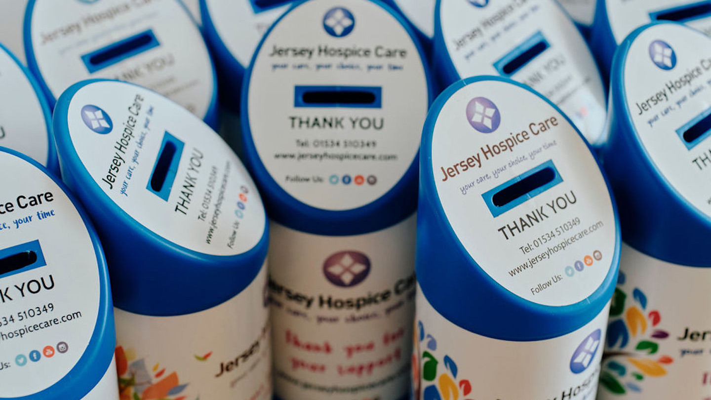 Image of blue Jersey Hospice Care collection tins