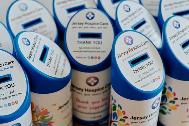 Image of blue Jersey Hospice Care collection tins