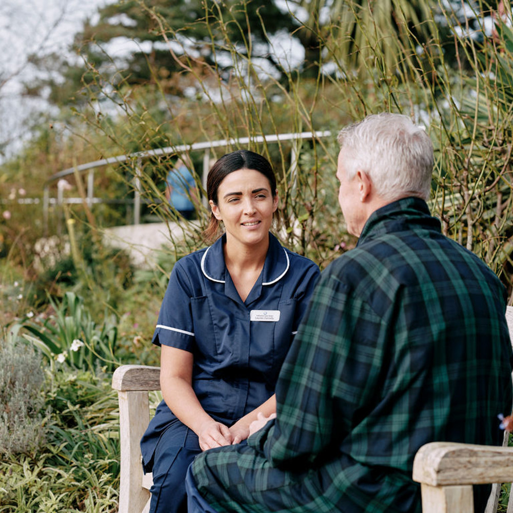 Nurse and patient in garden