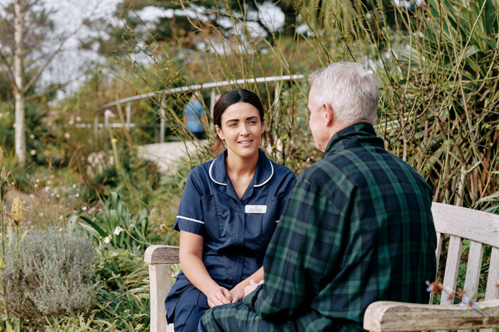 Nurse and patient in garden