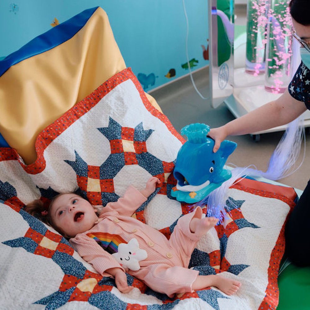 Sensory room with child and nurse