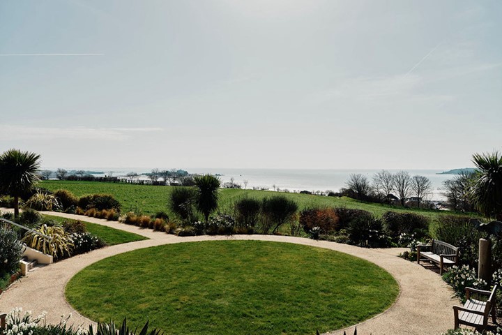 Image of hospice garden and view of the sea