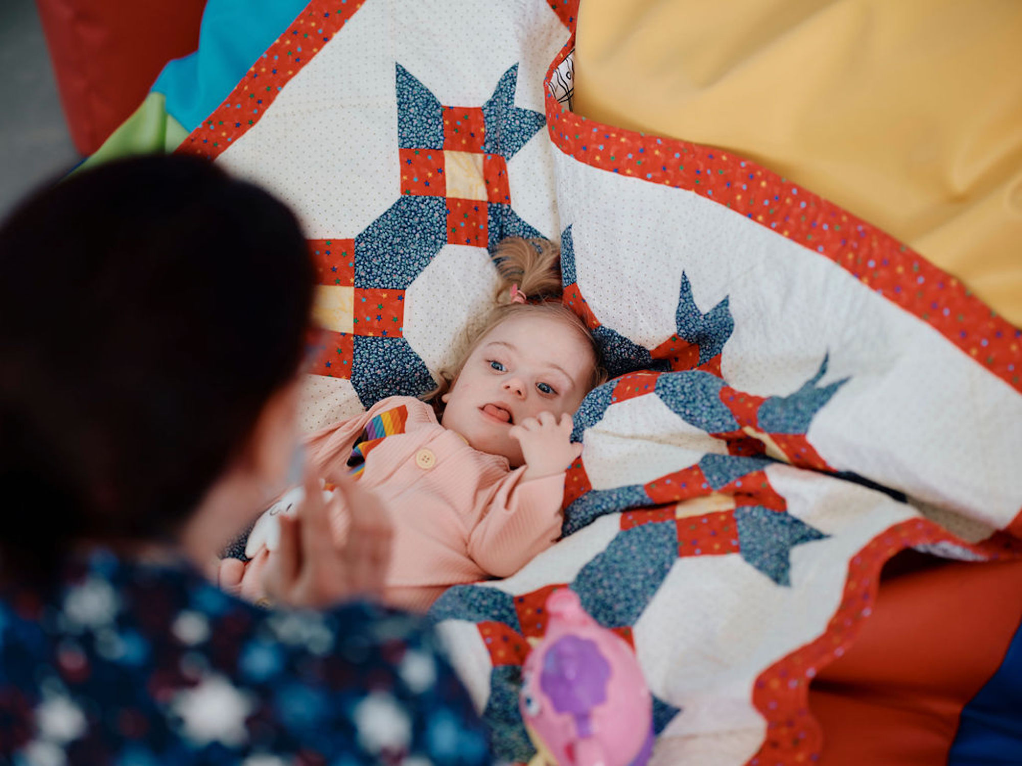 Image of baby and nurse in sensory room at Jersey Hospice Care