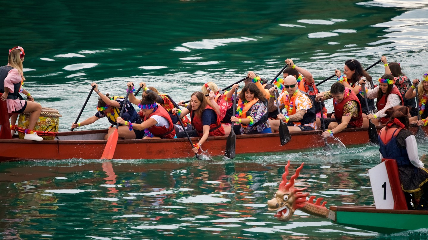 Image of two dragon boats racing