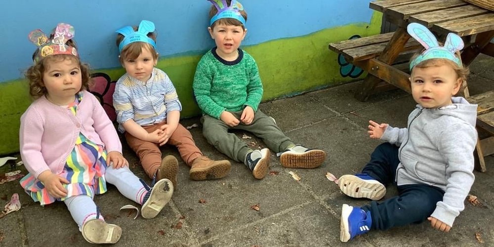 Image of children with bunny ears taking part in Hop for Hospice