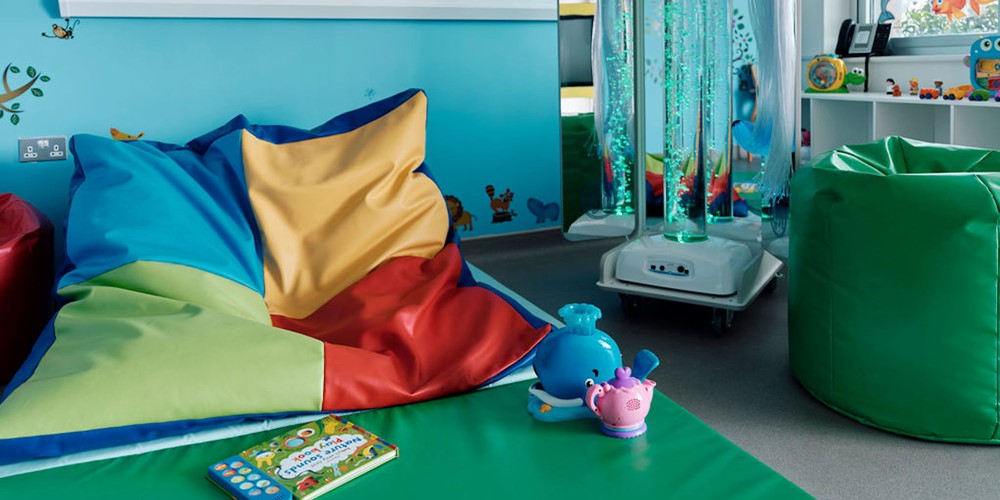 Image of sensory room, close up of mats and toys