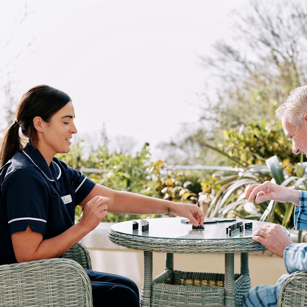 Nurse and patient in garden