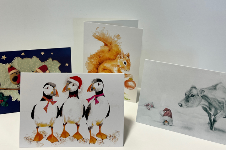 Image showing four Christmas cards for sale. 