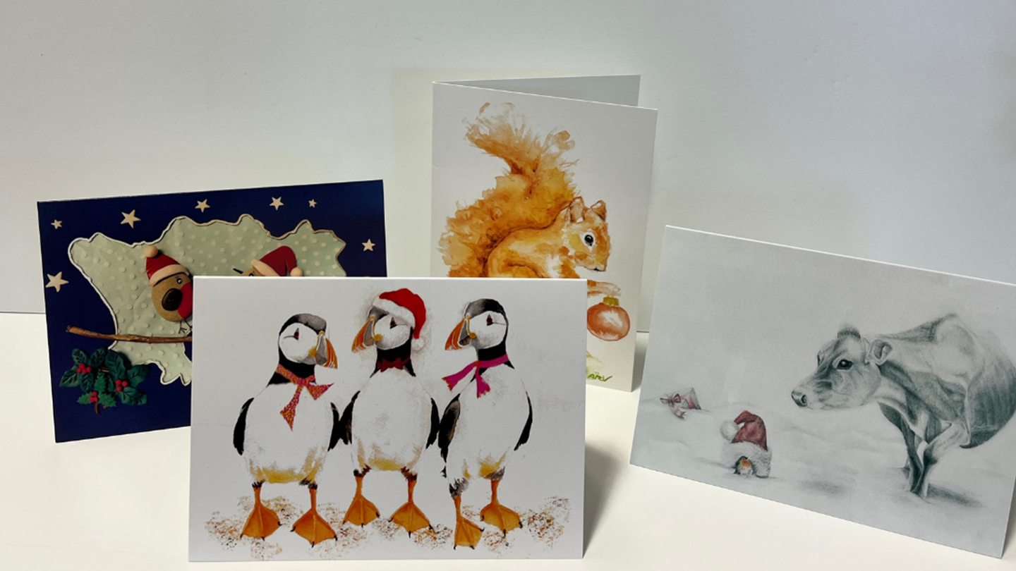 Image showing four Christmas cards for sale. 
