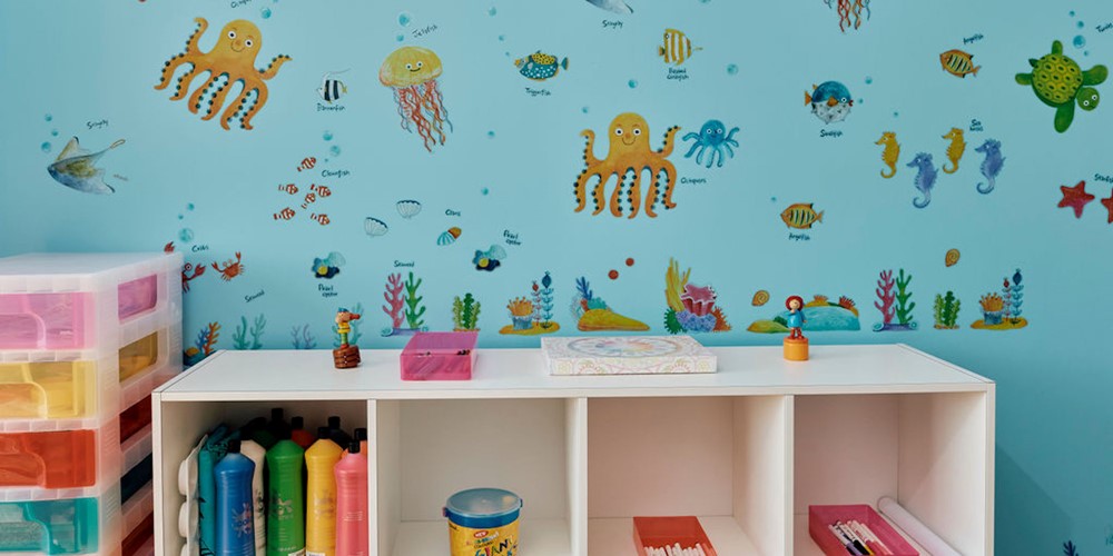 Image of Sensory room with arts and crafts station.  under the sea themed walls