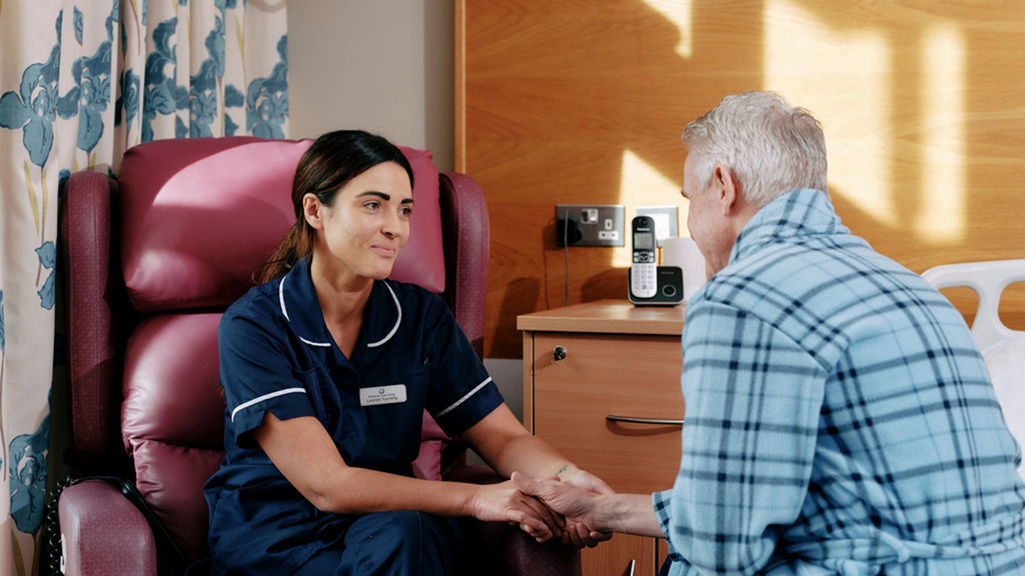 Nurse and patient talking