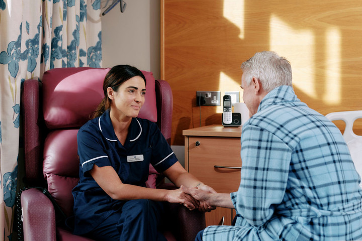 Nurse and patient talking