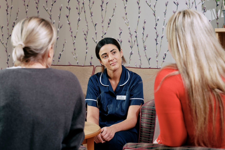 Nurse talking to family